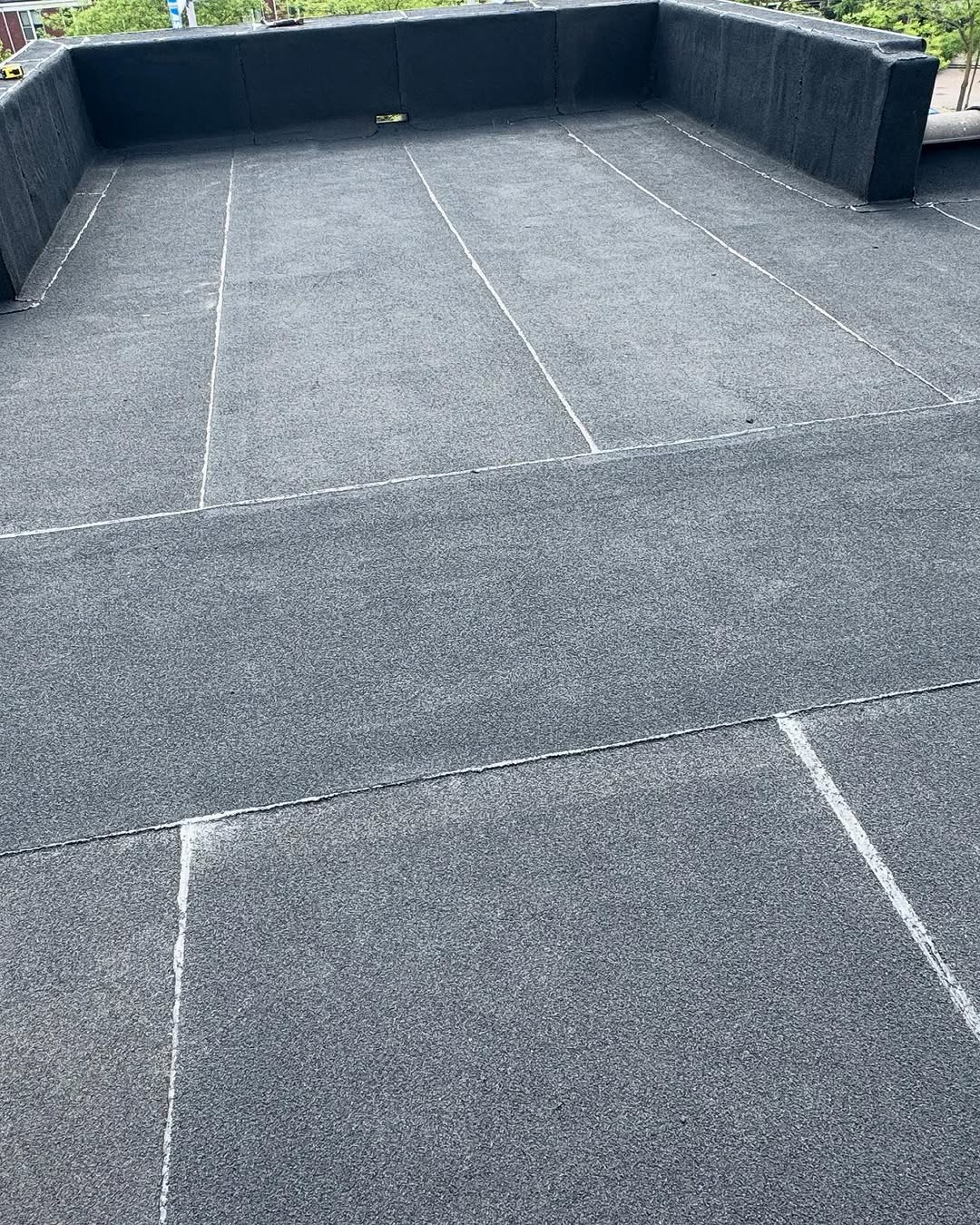 Renovatie bitumendak met premium toplaag